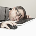 employee-dozing-at-desk-150x150